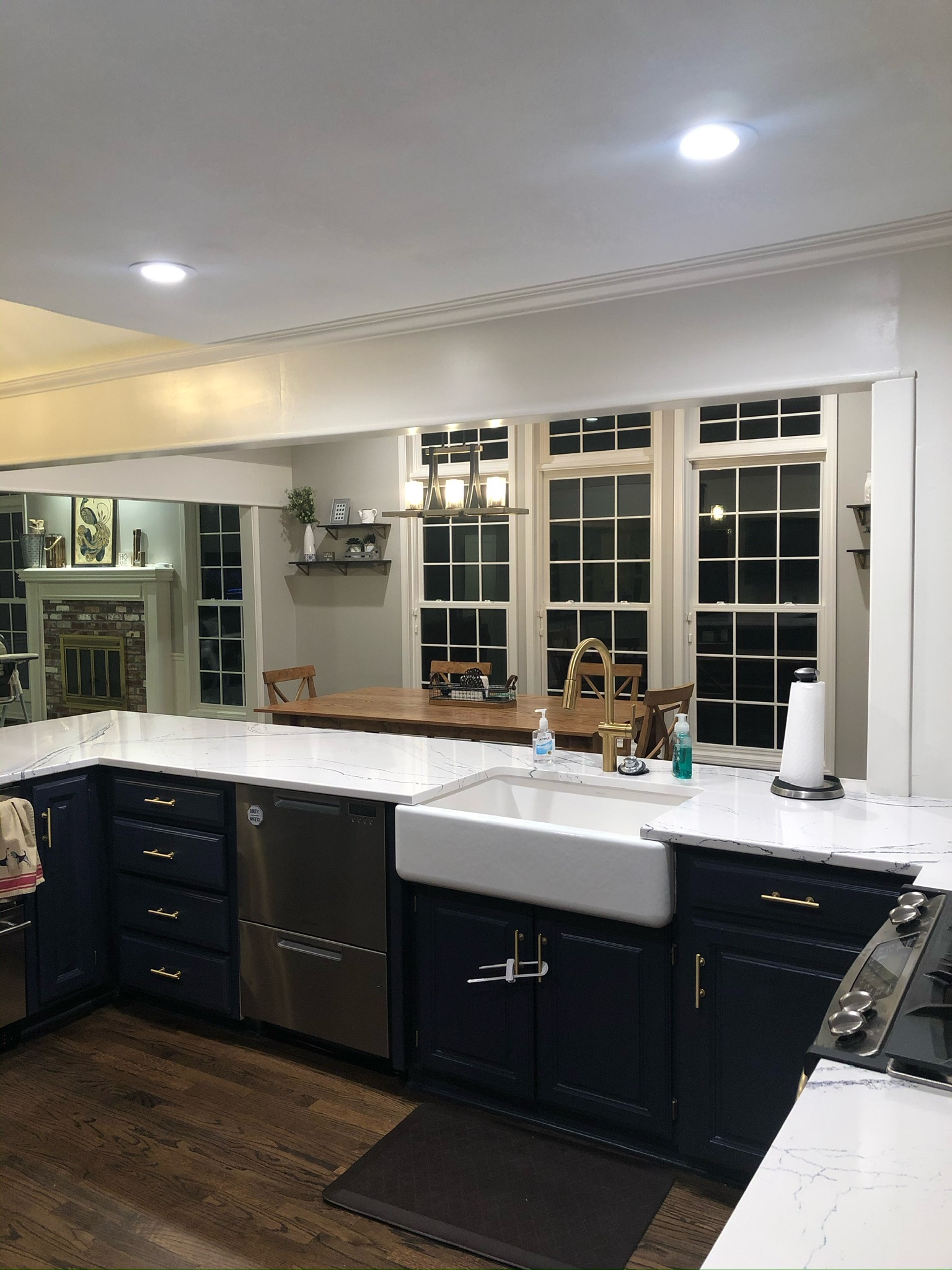 Completed kitchen sink area looking through the new opening to the dining area